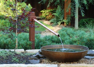 hot landscaping ideas include a variety of water features like this one